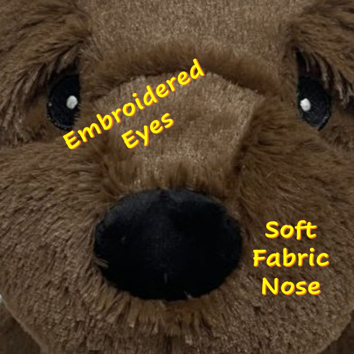 Close up of the Chocolate Labrador / Lab Retriever Plush Dog Toy for Dogs, showing embroidered eyes and felt nose.